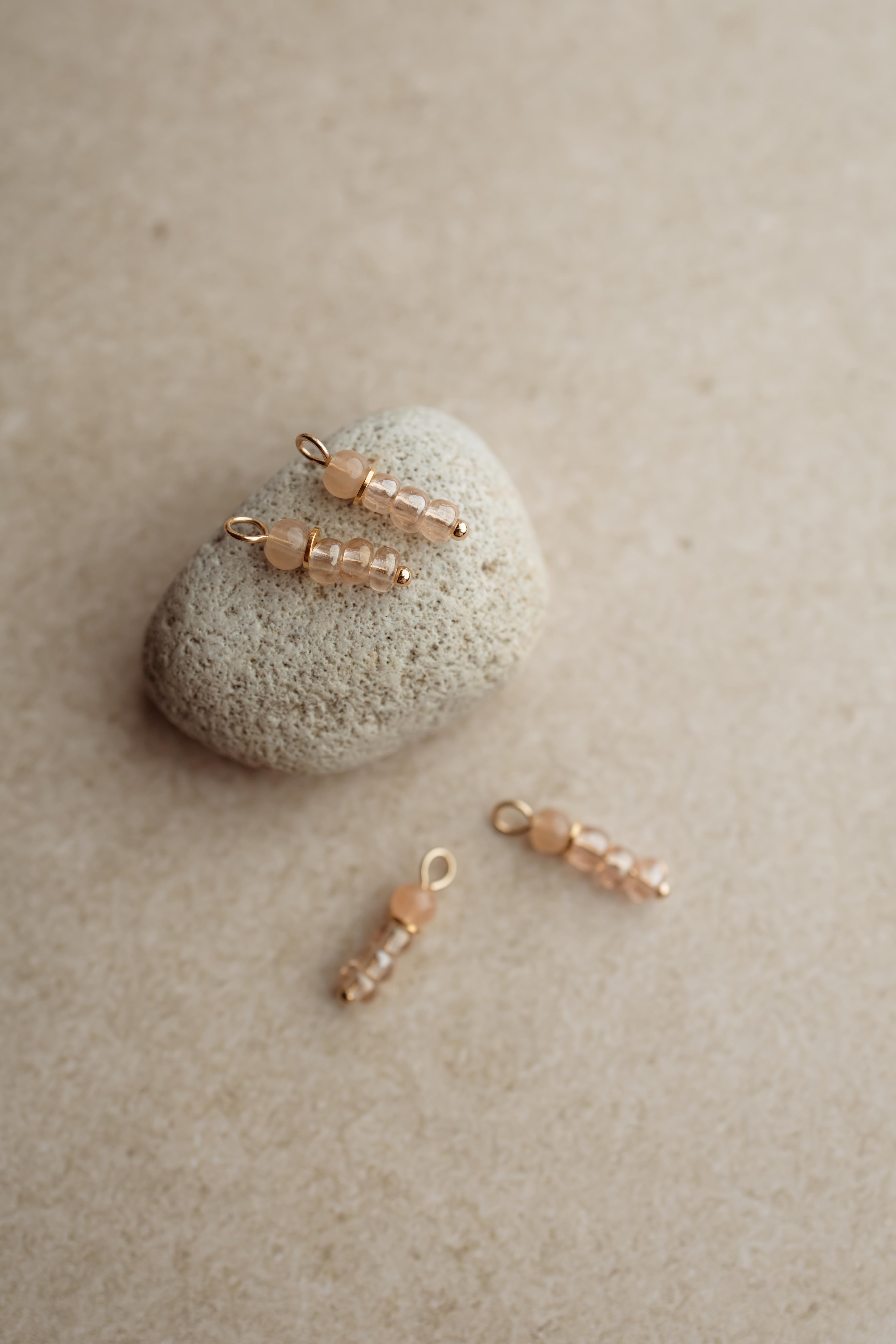 Charm light pink beads