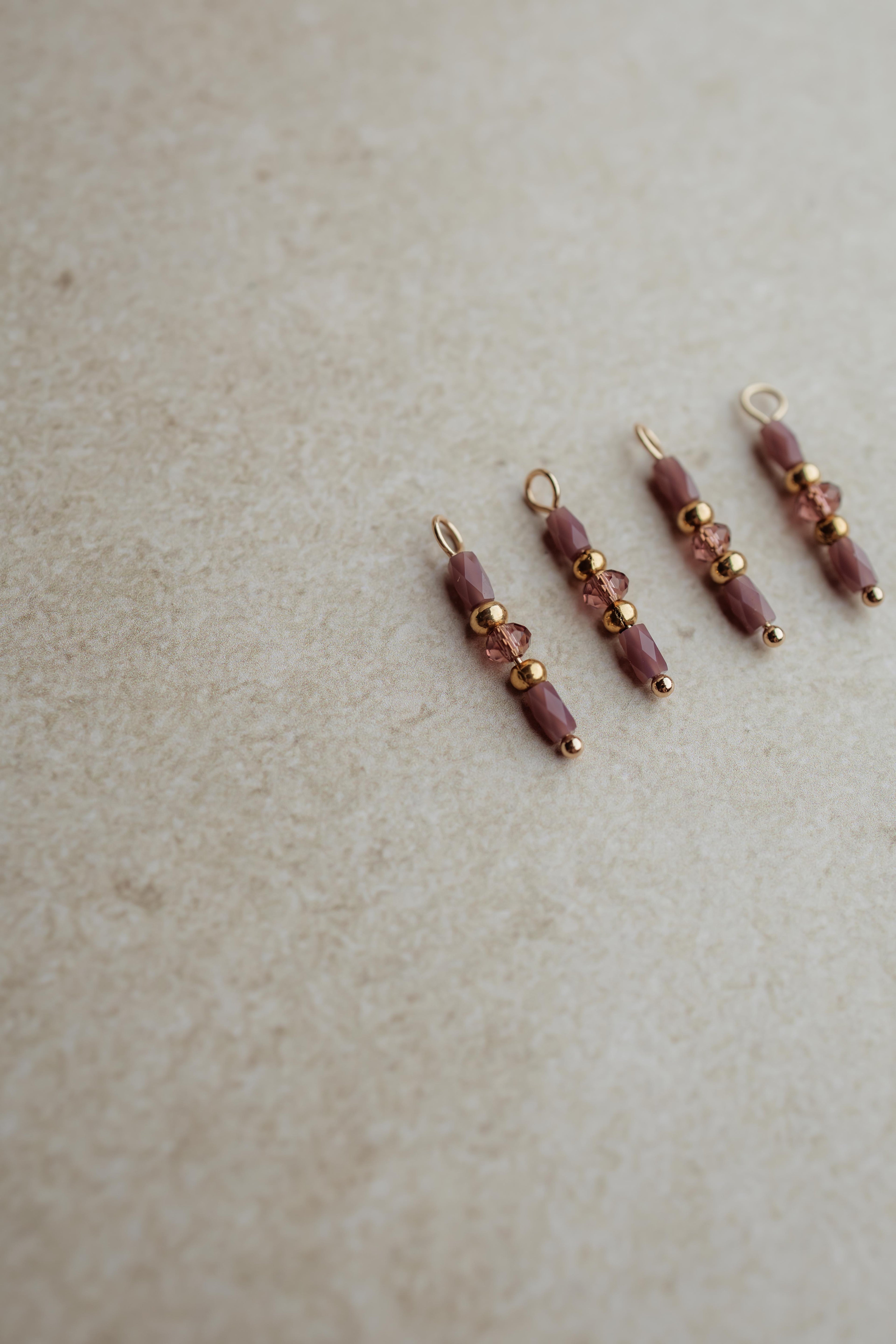 Charm bordeaux beads