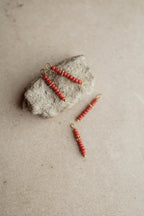 Charm red beads