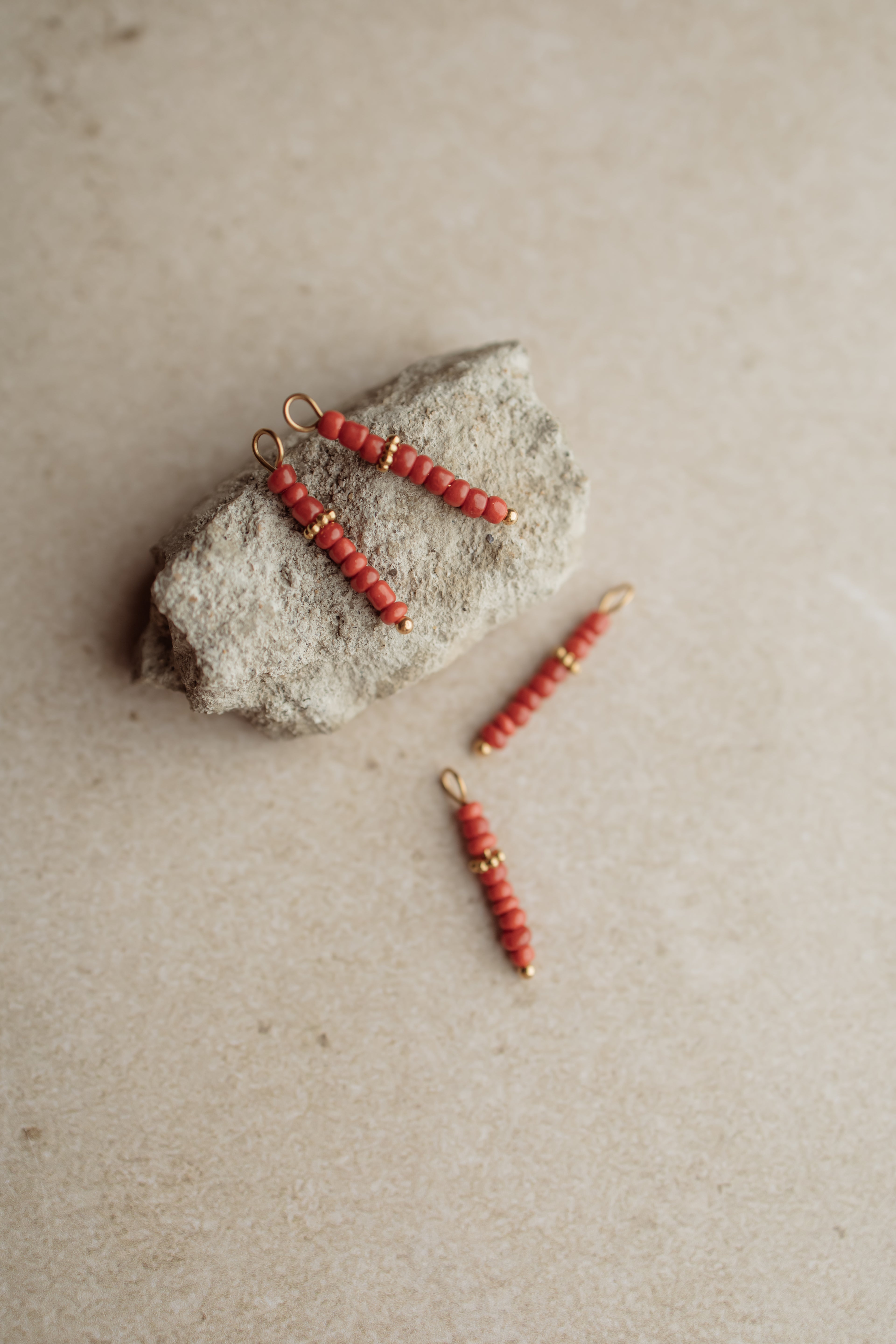 Charm red beads