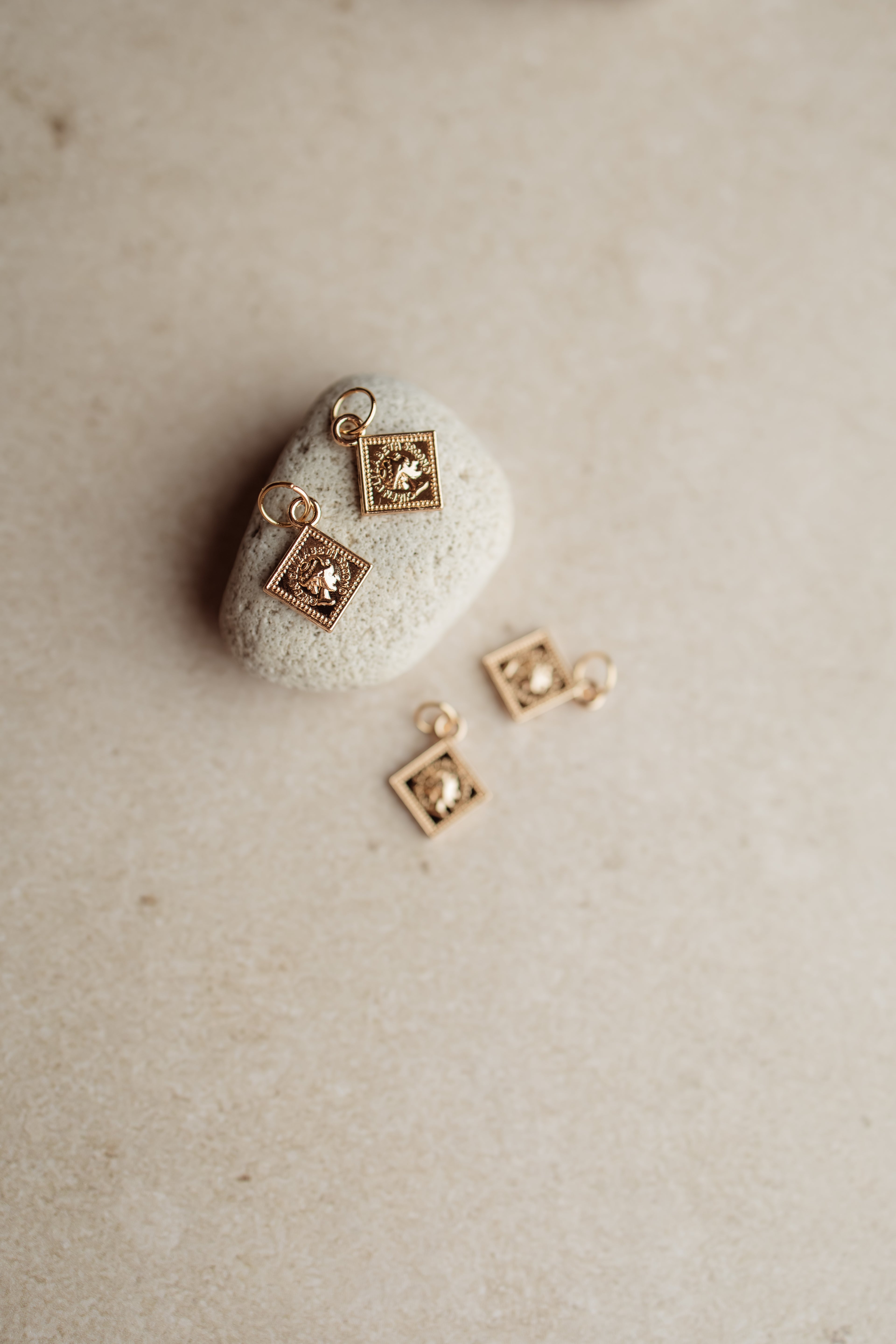 Charm square coin
